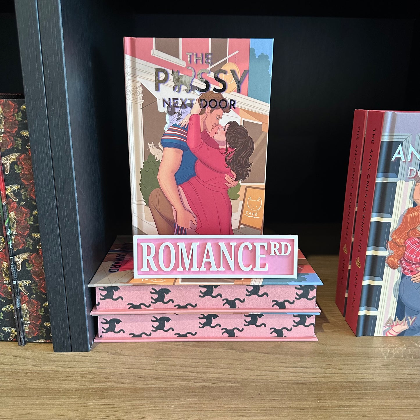 Romance Rd Shelf Sign